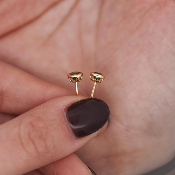 0.50 Carat Oval Emerald Bezel Set 18K Gold Stud Earrings