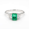 1/2 Carat Emerald and Baguette Diamond 3 Stone Platinum Ring