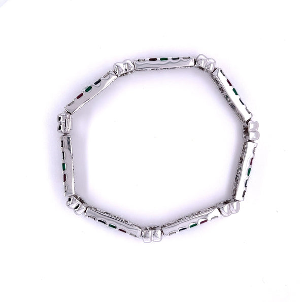 alt
Bracelet en or blanc 18K avec 12 carats de diamants, rubis, émeraudes et saphirs
