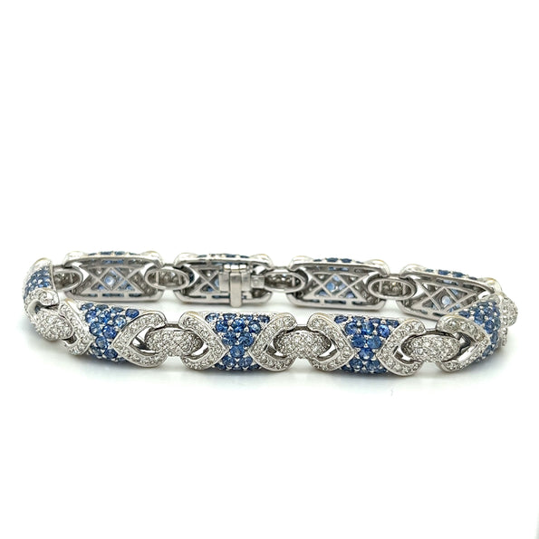 alt
Bracelet pavé en or blanc 18K avec diamants naturels et saphirs bleus naturels