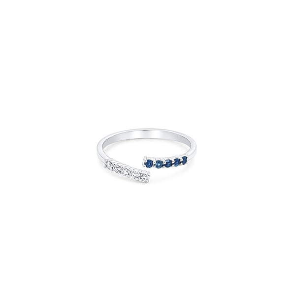 Fine bague croisée en or blanc 18 carats avec saphir bleu et diamant