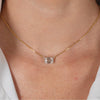 Collier flottant connecté en diamant lab-grown taille émeraude de 2 carats en or jaune et blanc 18K à deux tons