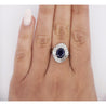 2.58 Carat Oval Cut Blue Sapphire and Diamond Halo Platinum Ballerina Ring