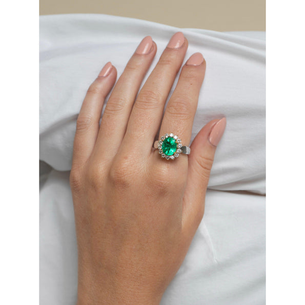 Bague halo en or blanc 18K avec émeraude colombienne vert vif de 3 carats et diamants