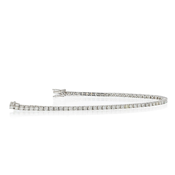 alt
Bracelet tennis en platine serti de diamants taille ronde, 4 carats TW