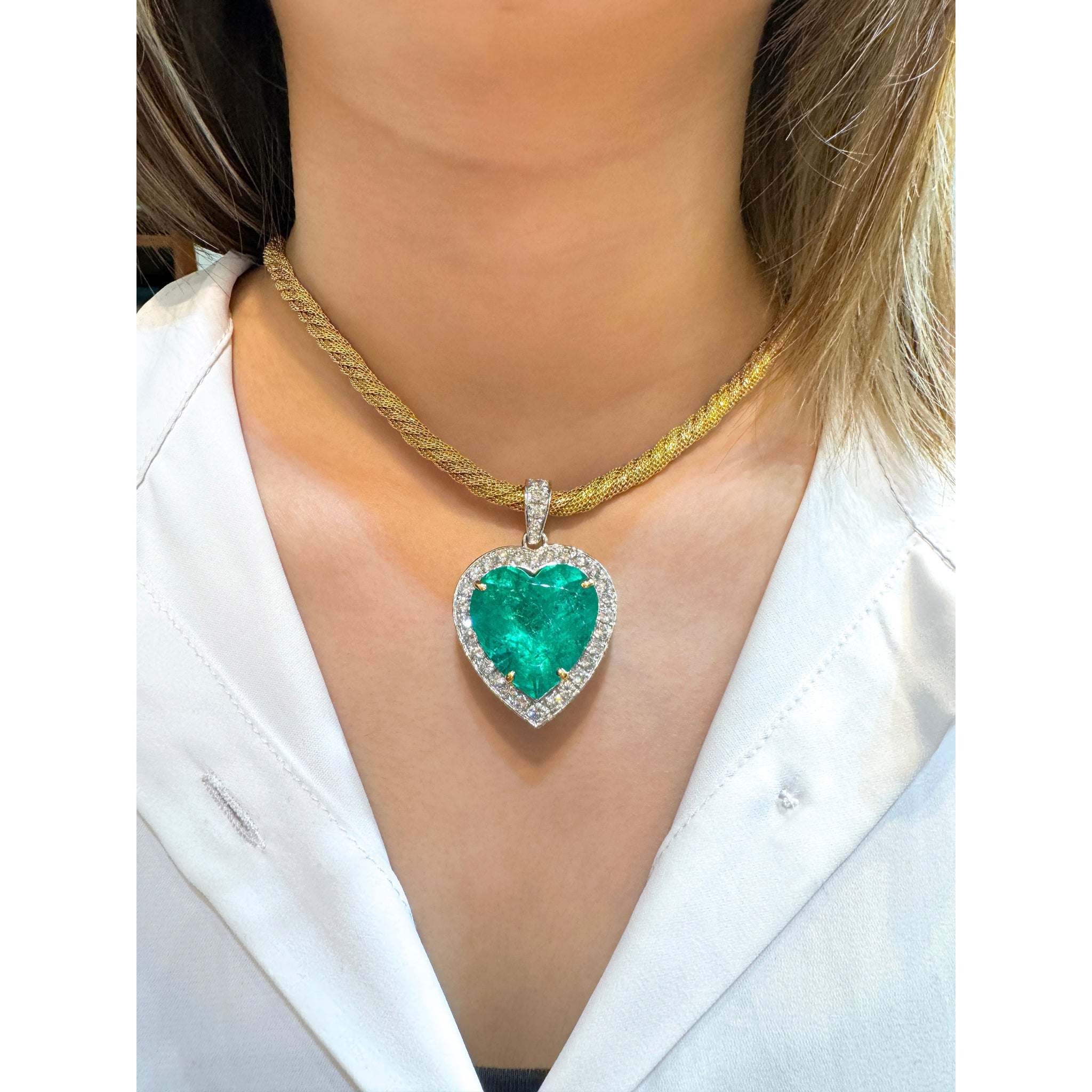 44 Carat Heart Shaped Emerald Pendant with Round Cut Diamond Halo in 18K Gold Necklace