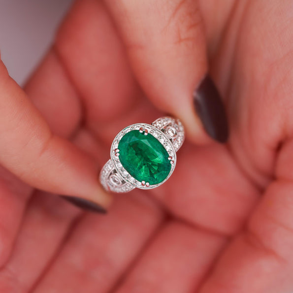 5.5 Carat Oval Cut Emerald & Diamond 18K White Gold Filigree Crossover Ring