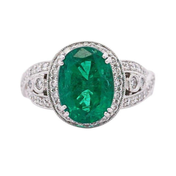 5.5 Carat Oval Cut Emerald & Diamond 18K White Gold Filigree Crossover Ring
