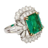 6.26 Carat Emerald Cut Emerald with Trillion and Round Cut Diamond Side Stone Ring in 18K White, Yellow Gold
