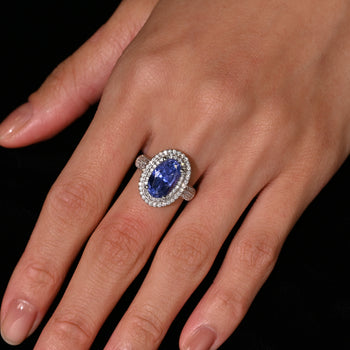 6.34 Carat No Heat Oval Cut Blue Sapphire and Diamond Halo 18K Ring GRS Certified – Assay Jewelers
