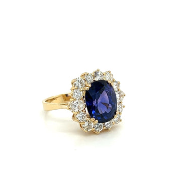 Ring con zaffiro blu taglio ovale da 7,15 carati e halo di diamanti in oro giallo 14K – Assay Jewelers