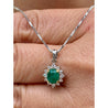 Cabochon Cut Emerald and Diamond pendant in 18k white gold floral/star design