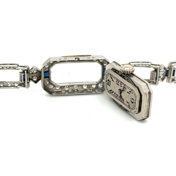 Orologio Eterna Art Déco in platino con diamanti e zaffiri blu – Assay Jewelers