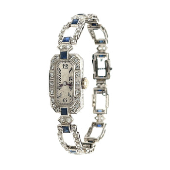 Orologio Eterna Art Déco in platino con diamanti e zaffiri blu – Assay Jewelers