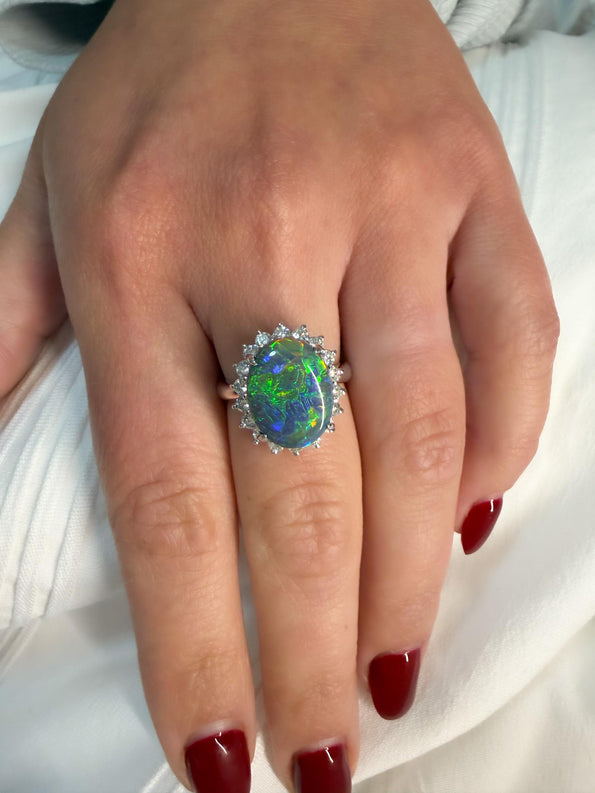 GIA Cert. 5.10 Carat Untreated Black Opal Diamond Halo Platinum Starburst Ring
