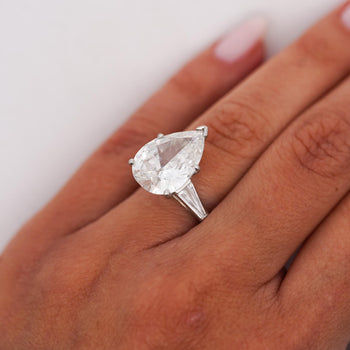 GIA Certified 7.03 Carat Pear Cut F/SI2 Diamond Platinum 3 Stone Ring – Assay Jewelers