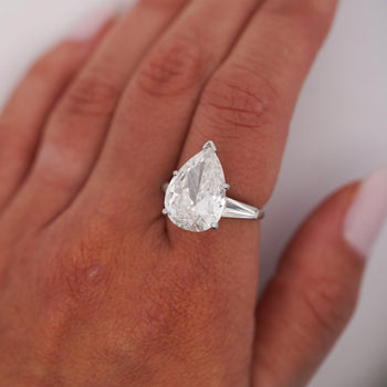 GIA Certified 7.03 Carat Pear Cut F/SI2 Diamond Platinum 3 Stone Ring – Assay Jewelers