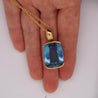 GIA Certified Cushion Cut Blue Topaz in 18K Gold Bezel Pendant Necklace