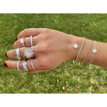 alt
Fede nuziale con diamanti naturali in montatura in oro bianco 18k – Assay Jewelers