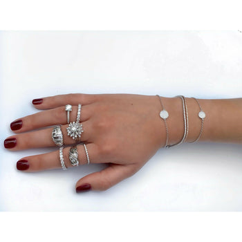 alt
Fede nuziale con diamanti naturali in montatura in oro bianco 18k – Assay Jewelers