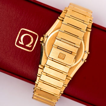 Omega Constellation Manhattan 18K Gold Roman Numeral Bezel Champagne Dial Watch – Assay Jewelers
