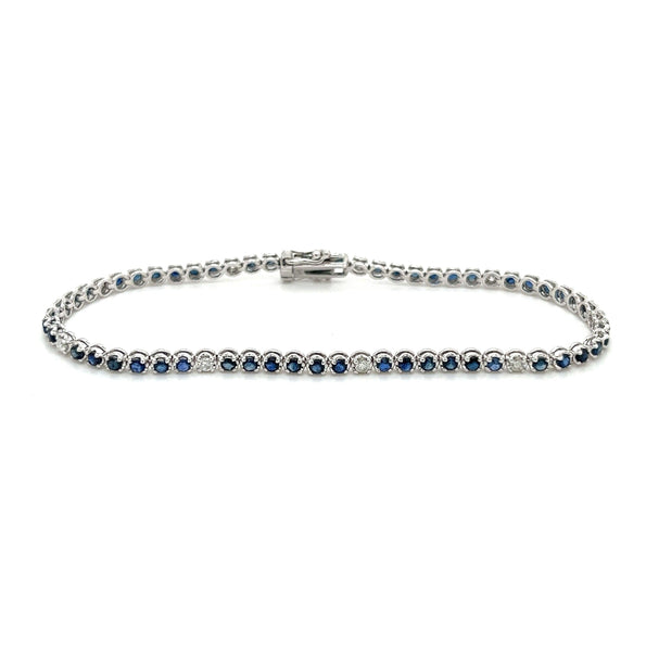 alt
Bracelet tennis à griffes en or blanc 14K avec saphirs bleus et diamants taille ronde