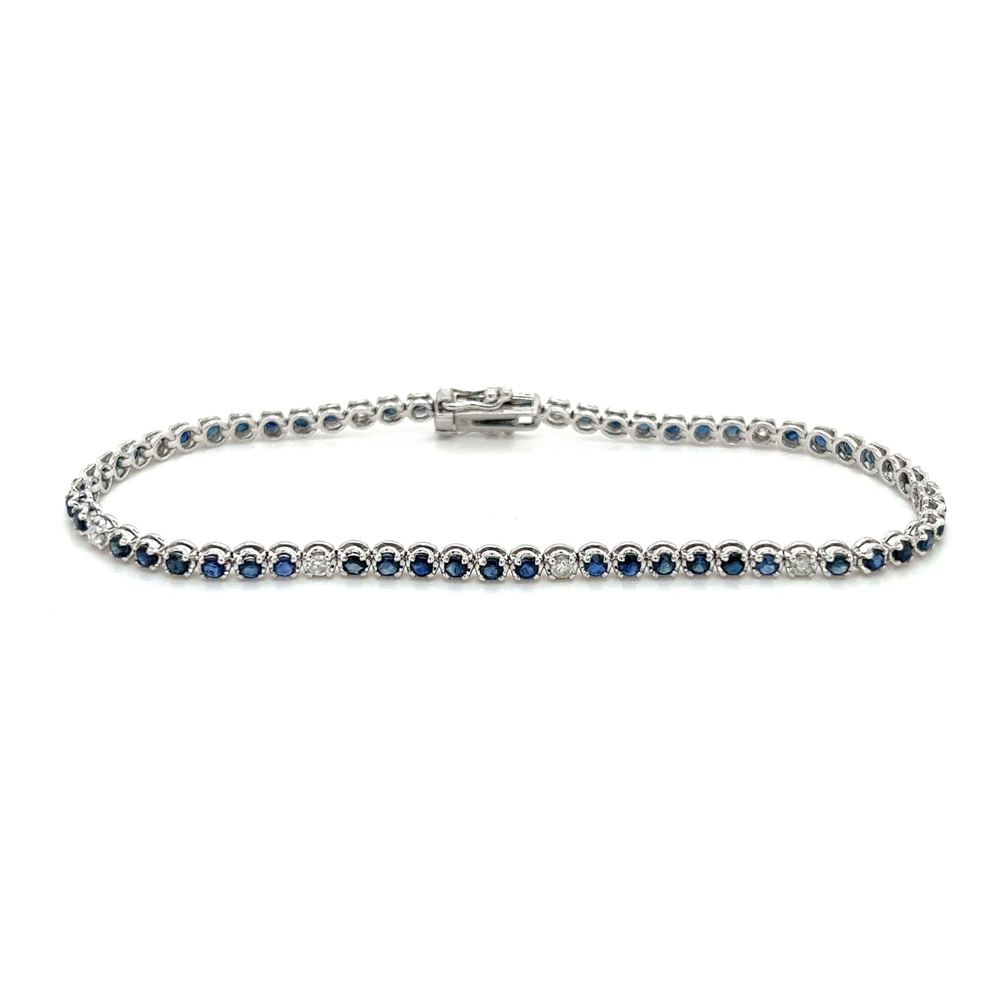 Round Cut Blue Sapphire & Diamond Prong Set Tennis Bracelet in 14K White Gold
