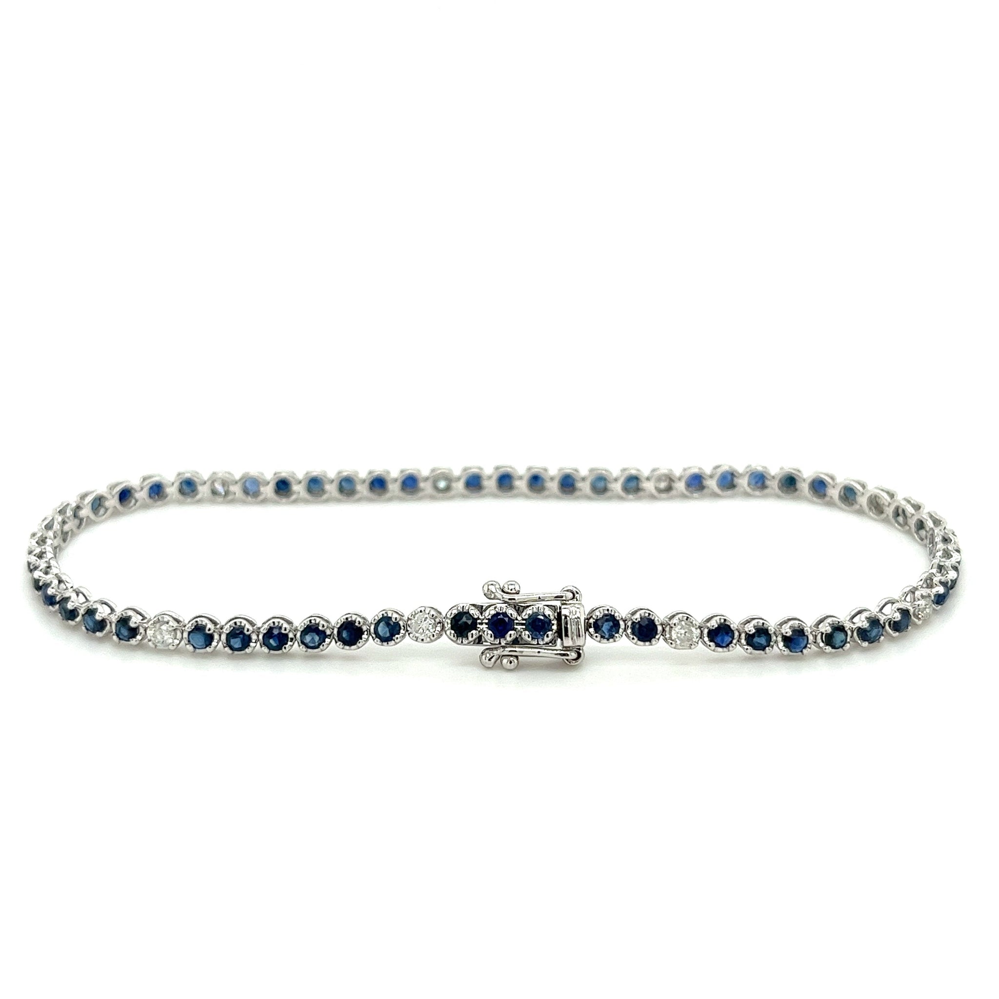 Round Cut Blue Sapphire & Diamond Prong Set Tennis Bracelet in 14K White Gold