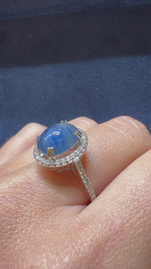 2.80 Carat Oval Cabochon Blue Star Sapphire and Diamond Halo Ring